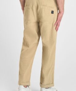 Pantalon de terciopelo beige de corte holgado y cinturilla elastica. 5