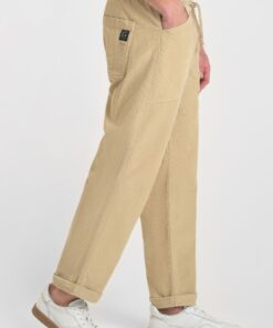 Pantalon de terciopelo beige de corte holgado y cinturilla elastica. 7