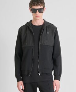 SUDADERA CON CREMALLERA REGULAR FIT EN MEZCLA ALGODÓN CON TEJIDO CONTRASTANTE 8 SUDADERA CON CREMALLERA REGULAR FIT EN MEZCLA ALGODON CON TEJIDO CONTRASTANTE Antony Morato MMFL01100 FA150168 9000 1